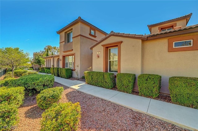 11356 Belmont Lake Dr Unit 103, Las Vegas, NV 89135 - view of front of house featuring stucco siding