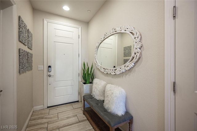 2198 Maderno St, Henderson, NV 89044 - doorway to outside with recessed lighting, baseboards, and wood finish floors