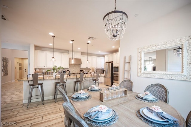 2198 Maderno St, Henderson, NV 89044 - dining space featuring visible vents, recessed lighting, a chandelier, and light wood-type flooring