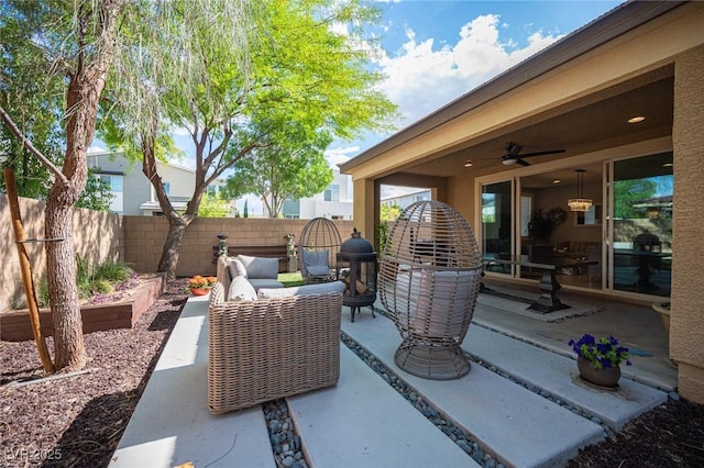 2198 Maderno St, Henderson, NV 89044 - view of patio featuring a fenced backyard, a ceiling fan, and an outdoor hangout area