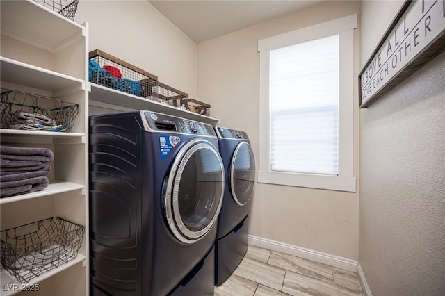 2198 Maderno St, Henderson, NV 89044 - laundry area with baseboards, laundry area, and washing machine and dryer