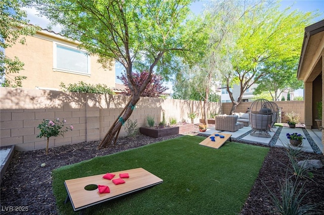2198 Maderno St, Henderson, NV 89044 - view of yard with a fenced backyard, an outdoor hangout area, and a patio area
