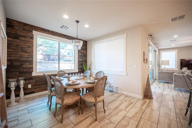 2198 Maderno St, Henderson, NV 89044 - dining area featuring recessed lighting, wood walls, and visible vents