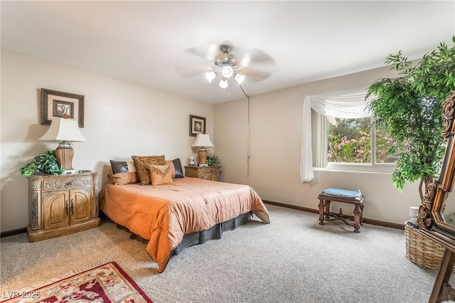 750 S Royal Crest Cir Unit 317, Las Vegas, NV 89169 - bedroom featuring light colored carpet, baseboards, and a ceiling fan