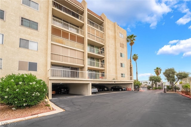 750 S Royal Crest Cir Unit 317, Las Vegas, NV 89169 - view of apartment building / complex featuring covered parking