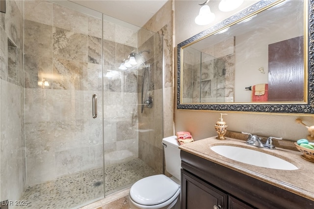 750 S Royal Crest Cir Unit 317, Las Vegas, NV 89169 - bathroom featuring a shower stall, toilet, and vanity