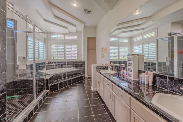 72 Innisbrook Ave, Las Vegas, NV 89113 - full bath with a shower stall, tile patterned floors, a bath, double vanity, and recessed lighting