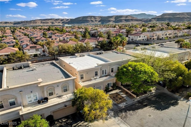 birds eye view of property with a residential view and a mountain view