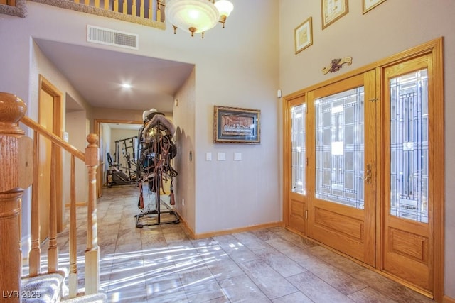 5180 N Dapple Gray Rd, Las Vegas, NV 89149 - entrance foyer with a towering ceiling, stairs, and baseboards