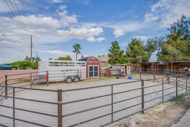 5180 N Dapple Gray Rd, Las Vegas, NV 89149 - view of play area with an outbuilding and an exterior structure