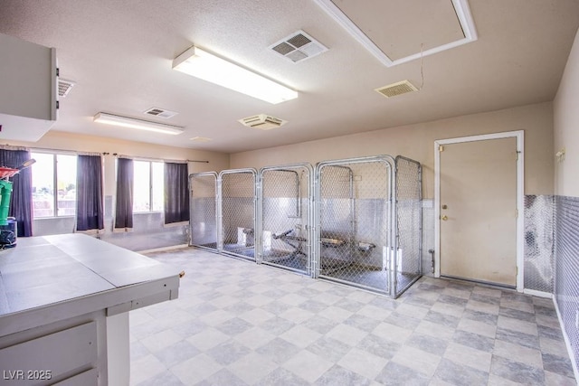 5180 N Dapple Gray Rd, Las Vegas, NV 89149 - miscellaneous room featuring attic access and tile patterned floors