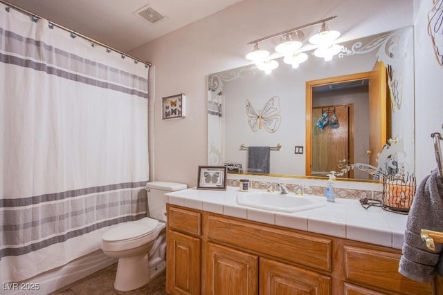 5180 N Dapple Gray Rd, Las Vegas, NV 89149 - full bathroom featuring toilet, vanity, and tile patterned flooring