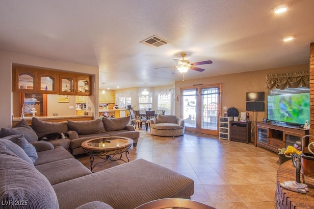 5180 N Dapple Gray Rd, Las Vegas, NV 89149 - living room with light tile patterned flooring and a ceiling fan