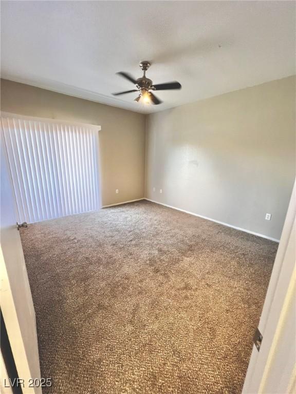 1881 W Alexander Rd Unit 1128, North Las Vegas, NV 89032 - empty room featuring ceiling fan and carpet floors