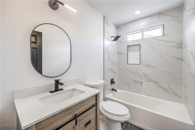 7413 Red Eagle St, Las Vegas, NV 89131 - bathroom featuring vanity, toilet, and bathtub / shower combination