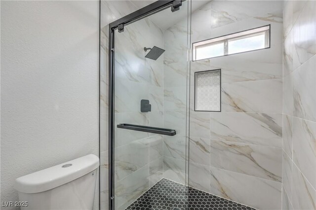 7413 Red Eagle St, Las Vegas, NV 89131 - full bathroom with a marble finish shower and toilet