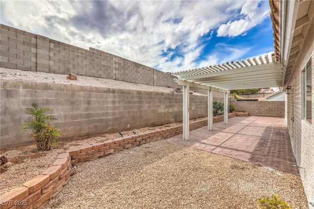 7413 Red Eagle St, Las Vegas, NV 89131 - fenced backyard featuring a pergola and a patio area