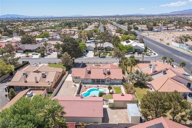 birds eye view of property featuring a mountain view and a residential view