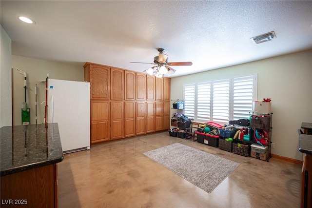 rec room featuring concrete flooring, a ceiling fan, recessed lighting, and visible vents