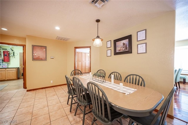 dining space with visible vents, recessed lighting, baseboards, and light tile patterned flooring