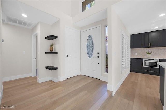 6961 Emerald Springs Ln, Las Vegas, NV 89113 - foyer entrance featuring light wood-style flooring, recessed lighting, and baseboards