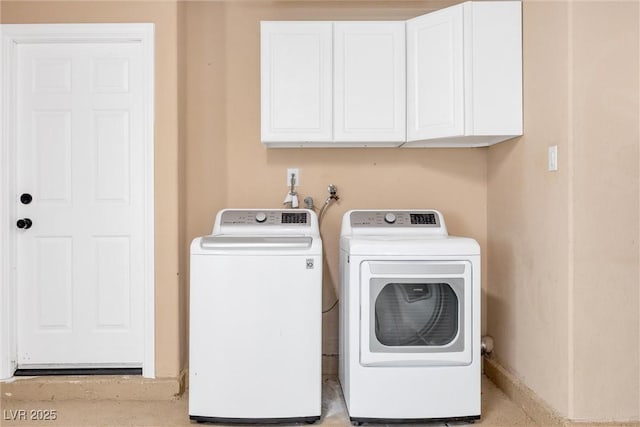 6961 Emerald Springs Ln, Las Vegas, NV 89113 - clothes washing area with cabinet space and independent washer and dryer
