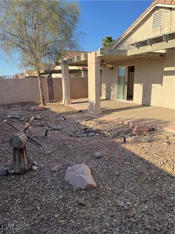 view of yard with a fenced backyard and a patio area