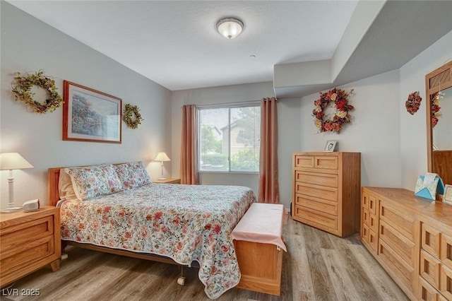 6868 Sky Pointe Dr Unit 1089, Las Vegas, NV 89131 - bedroom with light wood-style floors