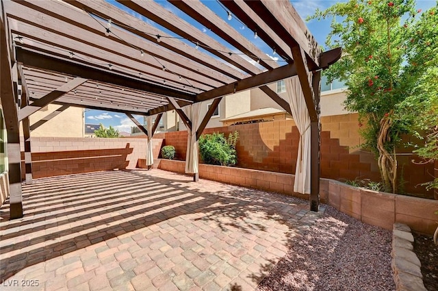 view of patio / terrace featuring a fenced backyard and a pergola