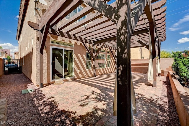 view of patio / terrace with a fenced backyard and a pergola