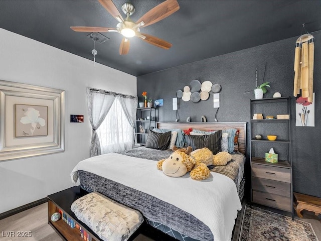6324 Desert Leaf St Unit 3, North Las Vegas, NV 89081 - bedroom featuring visible vents, wood finished floors, and ceiling fan