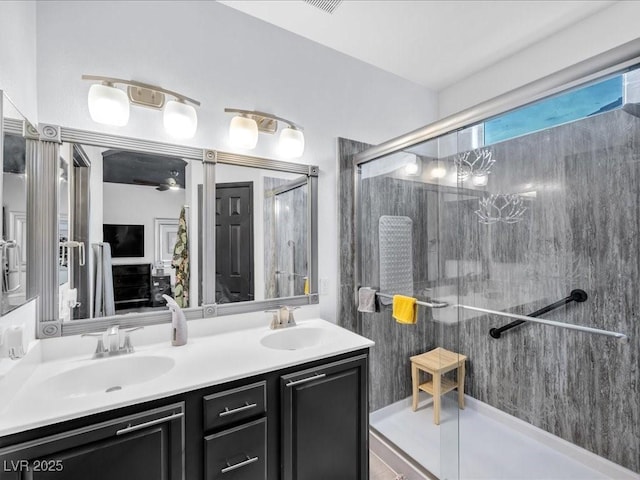 6324 Desert Leaf St Unit 3, North Las Vegas, NV 89081 - full bath featuring a sink, double vanity, and a shower stall
