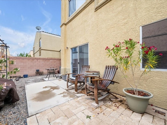 6324 Desert Leaf St Unit 3, North Las Vegas, NV 89081 - view of patio featuring fence