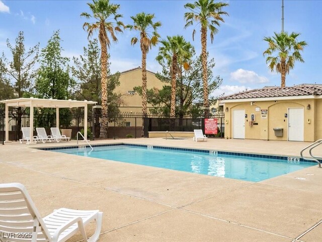 6324 Desert Leaf St Unit 3, North Las Vegas, NV 89081 - pool with a patio area and fence