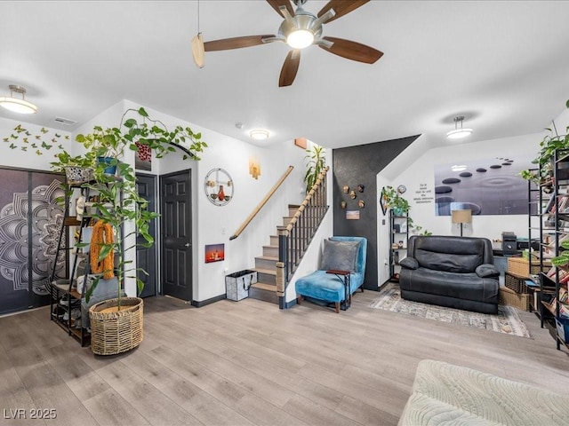 6324 Desert Leaf St Unit 3, North Las Vegas, NV 89081 - living area featuring stairs, a ceiling fan, and wood finished floors
