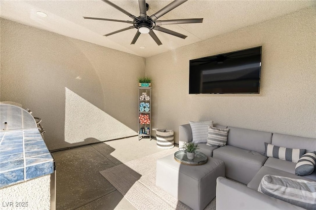 living room featuring ceiling fan