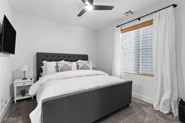 bedroom featuring baseboards, multiple windows, carpet flooring, and visible vents