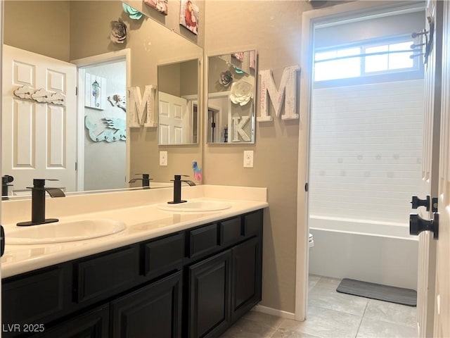 2585 Amazing Meadows Ave Unit 1007, North Las Vegas, NV 89031 - full bath featuring a sink, double vanity, and tile patterned flooring
