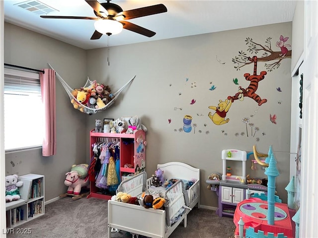 2585 Amazing Meadows Ave Unit 1007, North Las Vegas, NV 89031 - carpeted bedroom with baseboards, a ceiling fan, and visible vents