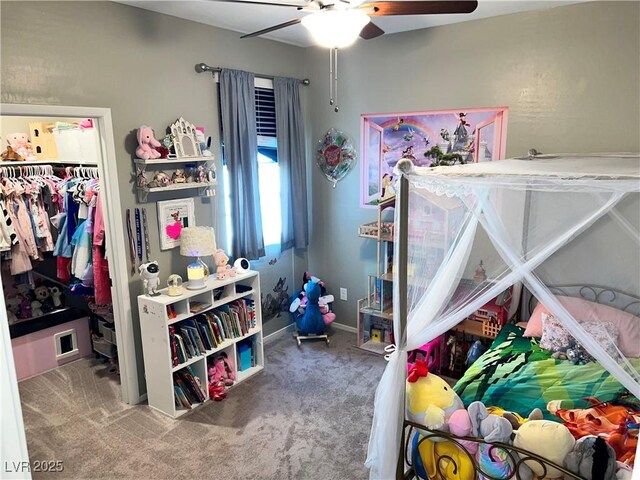 2585 Amazing Meadows Ave Unit 1007, North Las Vegas, NV 89031 - carpeted bedroom with a ceiling fan, a spacious closet, a closet, and baseboards
