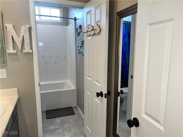 2585 Amazing Meadows Ave Unit 1007, North Las Vegas, NV 89031 - full bath featuring vanity, toilet, shower / washtub combination, and tile patterned flooring