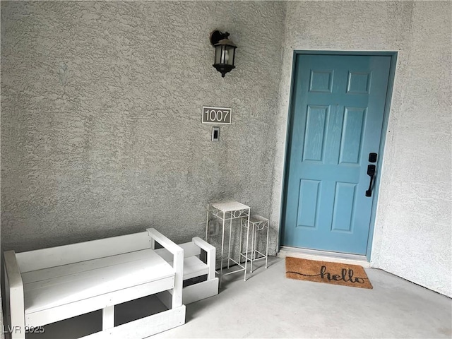2585 Amazing Meadows Ave Unit 1007, North Las Vegas, NV 89031 - view of exterior entry with stucco siding