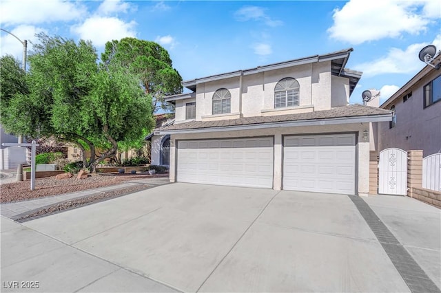 2808 Deep Water Cir, Las Vegas, NV 89117 - view of front of property featuring concrete driveway, an attached garage, and stucco siding