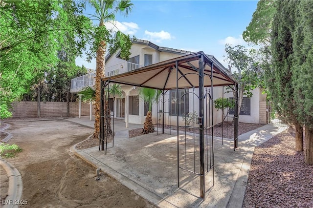 2808 Deep Water Cir, Las Vegas, NV 89117 - rear view of property featuring a gazebo, a patio, and stucco siding