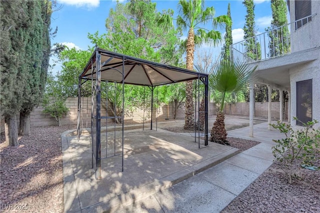 2808 Deep Water Cir, Las Vegas, NV 89117 - fenced backyard with a gazebo and a patio