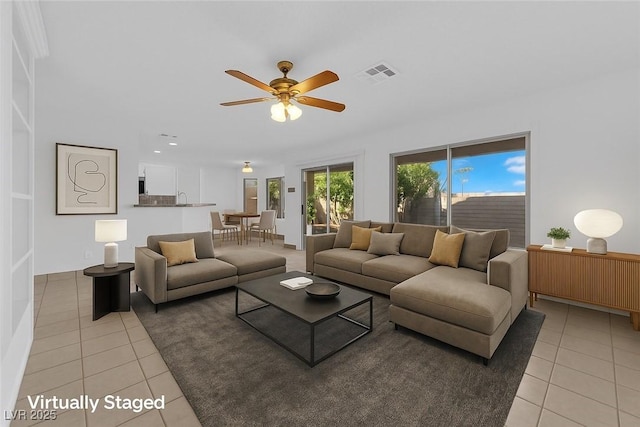 2808 Deep Water Cir, Las Vegas, NV 89117 - living room featuring light tile patterned floors and ceiling fan