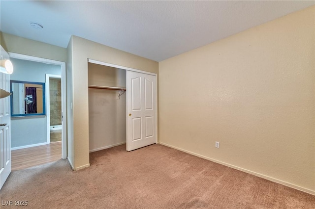 7751 Locke Haven Dr, Las Vegas, NV 89123 - unfurnished bedroom with carpet floors, baseboards, and a closet