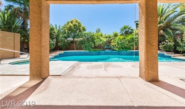 7751 Locke Haven Dr, Las Vegas, NV 89123 - swimming pool featuring a patio area and a fenced backyard