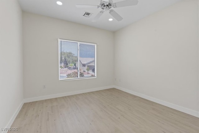 empty room featuring ceiling fan, visible vents, baseboards, recessed lighting, and light wood-style flooring