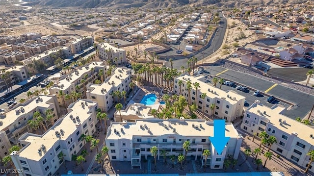 drone / aerial view featuring a mountain view